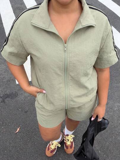 Muchica Conjunto de 2 piezas casual para uso diario con top de manga corta con cremallera y shorts con bloques de color para mujer talla grande