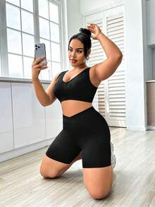 Easithlete Shorts deportivos de cintura alta de unicolor con bolsillos para mujer de talla grande - Negro - Ver 5