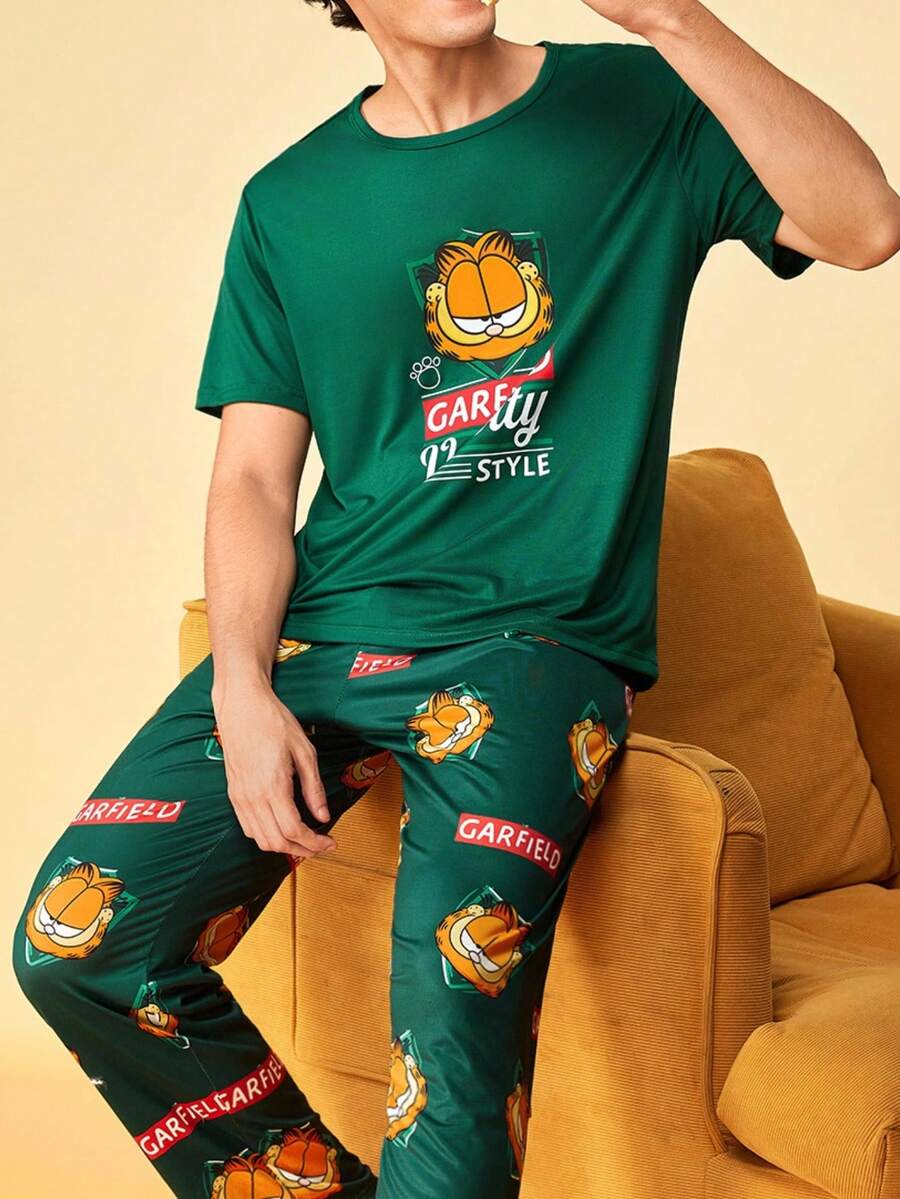 Notgurli GARFIELD | SHEIN Conjunto de ropa de estar en casa con camiseta de manga corta y pantalones estampados de marca compartida para hombre - Multicolor - Ver 1