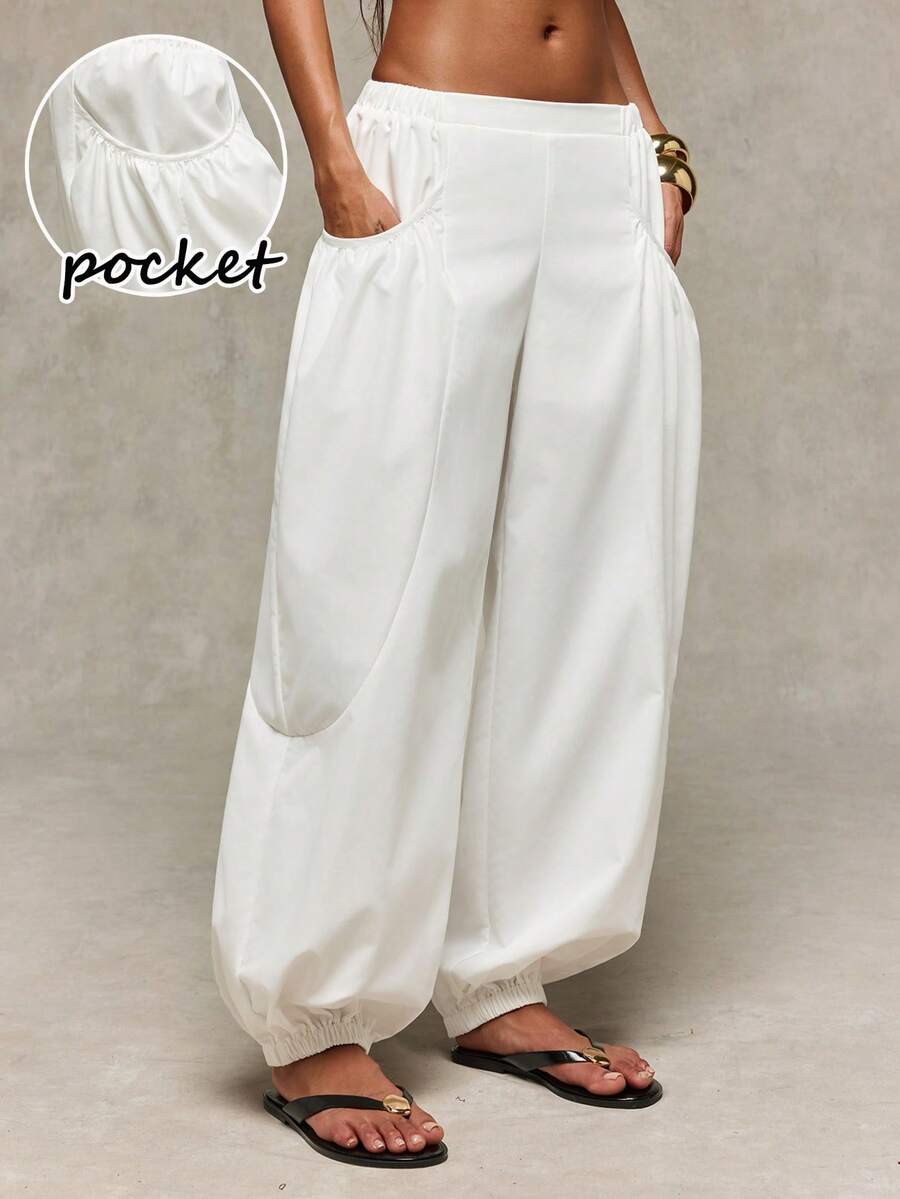 Normani Women's White Balloon Trousers, Low-Rise Harem Pants, Featuring Pleats And Pockets; An Elegant Choice For A Stylish, Casual Summer Look. Vacation - White - View 1