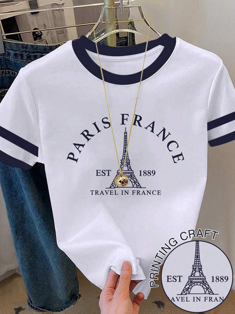 少女休闲简约时尚经典巴黎埃菲尔铁塔图案T恤,印有“PARIS FRANCE 1889”英文字样,黑白撞色设计,圆领短袖高腰露脐常规款T恤,适合夏季穿着 - 彩色 - 查看 1