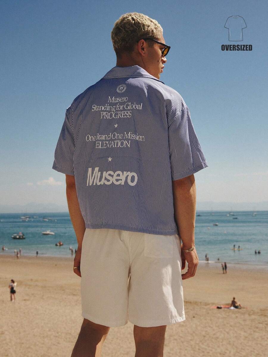 Musero Camisa holgada y oversize a rayas con estampado grande en la espalda, costura de hombro caída, cuello invertido y cierre de botones - Azul y blanco - Ver 1