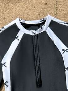 SHEIN Tween Girls Long Sleeve Sun Protection Zipper Black Solid Color Patchwork White Base Black Bow Print, Long Pants Two Pieces Swimwear, Suitable For Beach, Play, Seaside, Casual, Summer - Multicolor - View 3