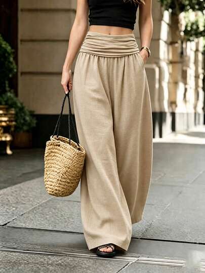SHEIN Holidaya بنطال نسائي بني واسع الساق بتصميم فضفاض ومجعد مع عقدة خيزران وجيوب، تصميم غير متماثل وملمس محبب، أنيق وعصري، مناسب للربيع والصيف والخريف والشتاء، لملابس العطلات وعيد الفصح وملابس الشاطئ، وملابس عيد الأم وحفل التخرج، وملابس الصيف والعطلات، وملابس العمل اليومية، وحفلات موسيقى الكانتري