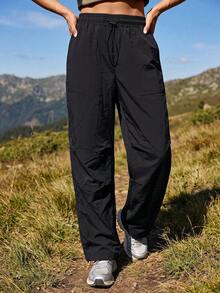 Exploreva Exploreva Women's Minimalist Solid Color Drawstring Waist Pocket Outdoor Long Pants For Sports - Black - View 3
