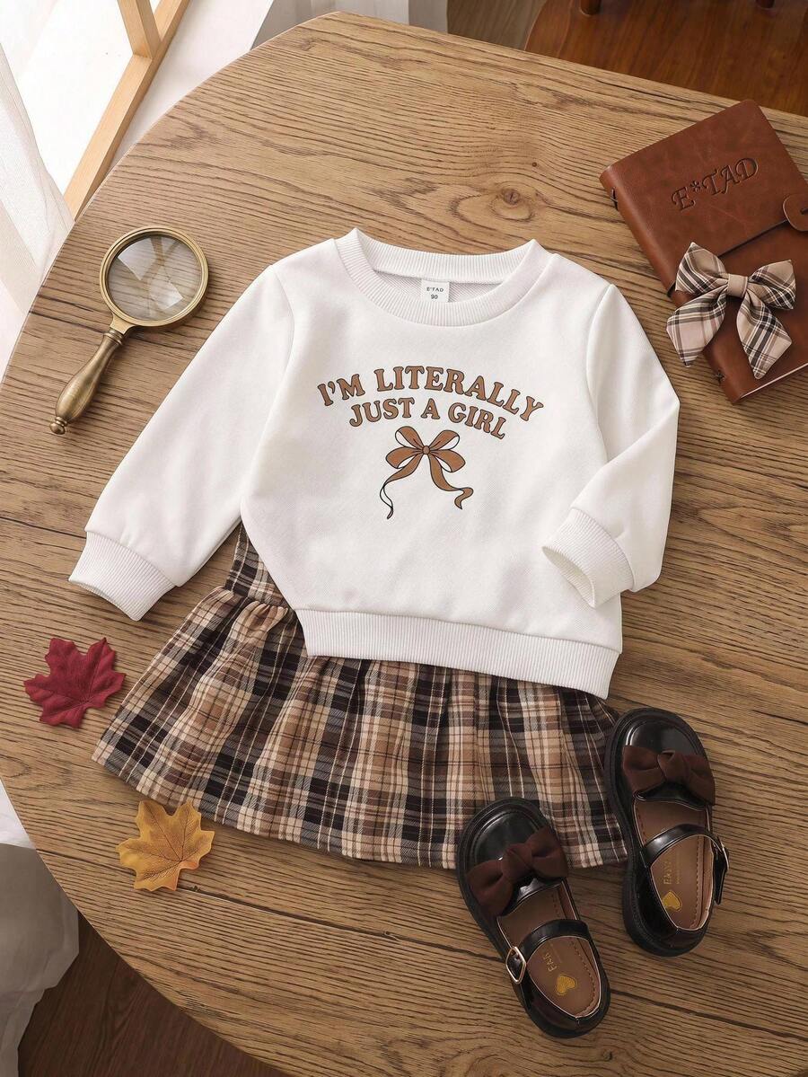 SHEIN 1pc Baby Girl Round Neck Long Sleeve Brown Plaid Sweatshirt With Patchwork Hem Dress, Featuring English Letter Bow Print, Casual Cute Vintage Fashion