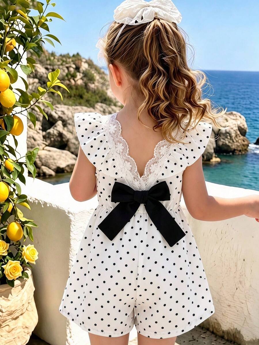 SHEIN Elladie kids 女童 2026 夏季新款黑色波點荷葉邊短袖 V 領收腰後蝴蝶結露背 A 字連身短褲,田園風時尚短版連身褲 - 黑與白 - 查看 1
