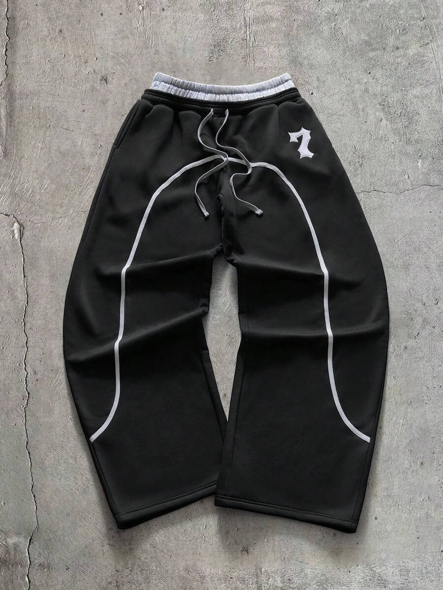 AXEPEAK Pantalones de chándal para hombre con doble cintura, cordón, bloques de color y bolsillos - Negro - Ver 1