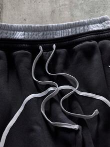 AXEPEAK Pantalones de chándal para hombre con doble cintura, cordón, bloques de color y bolsillos - Negro - Ver 4