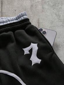 AXEPEAK Pantalones de chándal para hombre con doble cintura, cordón, bloques de color y bolsillos - Negro - Ver 3
