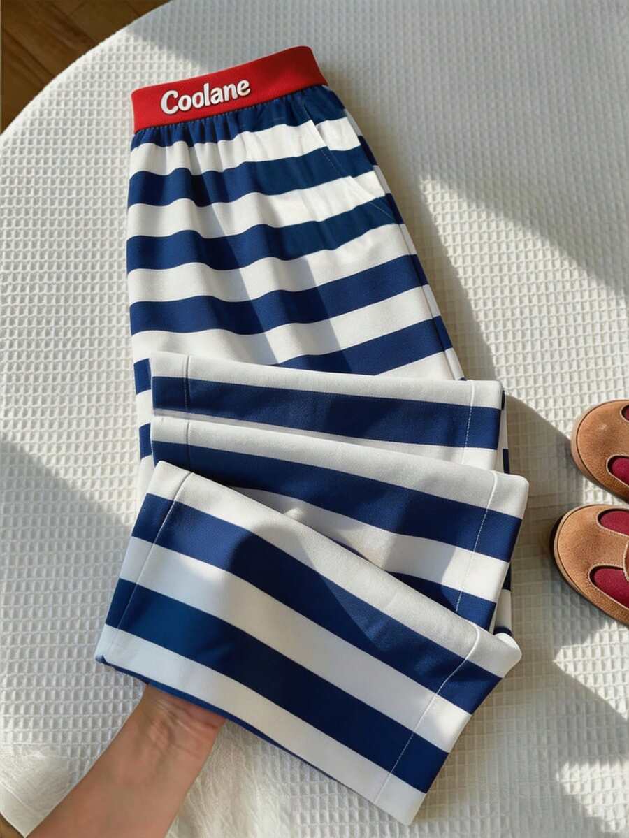 SHEIN بنطلون واسع الساق للفتيات المراهقات مع شريط جانبي مخطط وحزام خصر مطبوع عليه حروف العودة إلى المدرسة، تفاصيل الجيوب - متعدد الألوان - مشاهدة 1
