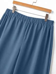 GlowEve CURVE Setelan 2 potong wanita ukuran plus, warna polos kontras, rajutan ikat 2 in 1, atasan kaos lengan pendek dan celana panjang longgar lurus, cocok untuk pakaian kasual sehari-hari. - Biru - View 3