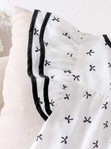 SHEIN Elladie kids 2件組 青少年女孩春夏新款休閒通勤裝，白色圓領波浪條紋蝴蝶結裝飾寬鬆飄逸袖上衣，搭配簡約百搭黑色梭織直筒長褲，適合日常外出 - 黑與白 - 查看 9