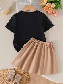 SHEIN Genkimix Kids Girls Casual Daily Short Sleeve Bow Decor Black T-Shirt & Khaki Pleated Skirt Academy Style Summer Dress Set - Multicolor - View 2