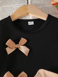 SHEIN Genkimix Kids Girls Casual Daily Short Sleeve Bow Decor Black T-Shirt & Khaki Pleated Skirt Academy Style Summer Dress Set - Multicolor - View 3