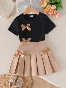 SHEIN Genkimix Kids Girls Casual Daily Short Sleeve Bow Decor Black T-Shirt & Khaki Pleated Skirt Academy Style Summer Dress Set - Multicolor - View 5