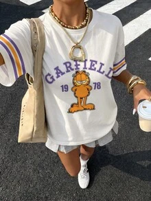 Muchica GARFIELD | SHEIN 休閒極簡圓領短袖寬鬆女款T恤，適合夏季，聯名印花圖案，適合外出、街頭穿搭、機場、時尚、返校季、Y2K、派對、海灘度假、假期 - 彩色 - 查看 7