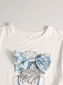 SHEIN 女童 2 件套休閒套裝，短袖圓領女孩印花 T 恤搭配 3D 黃色花朵蝴蝶結 + 花卉印花 A 字裙，青少年女孩甜美風 - 藍色 - 查看 3