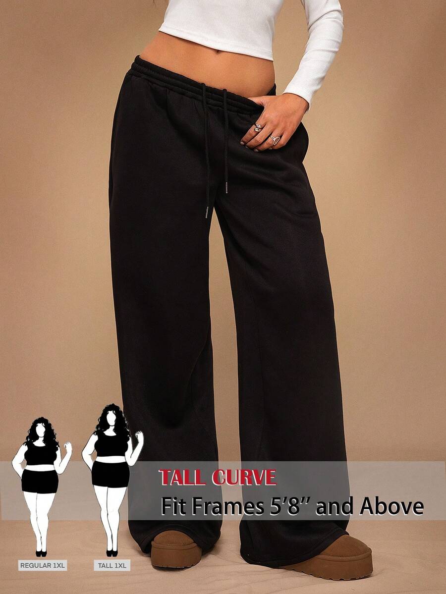 SHEIN Tall CURVE بنطلون رياضي فضفاض كاجوال للنساء بمقاسات كبيرة، لون موحد، خصر برباط سحب، أرجل واسعة - الأسود - مشاهدة 1