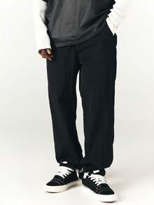 SUMWON Mens Loose Fit Nylon Track Pants With Elastic Ankles And Side Pockets Casual Streetwear Trousers For Spring Summer - Black - View 1