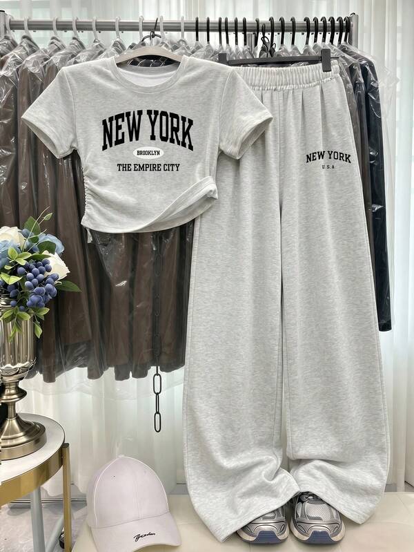 SHEIN Setelan 2 Potong Kaos Lengan Pendek Leher Bulat Pas Badan dan Celana Longgar Kasual Motif Bunga Abu-abu Muda, Huruf NY Bergaya Olahraga, Cocok untuk Anak Perempuan Remaja, Kasual Sehari-hari, Modis, Jalanan, Kampus, Olahraga, Kembali ke Sekolah