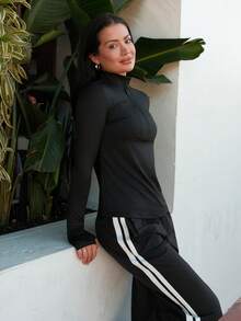 Nelanie Turli Half-Zip Thumb Hole Sportswear Long Sleeve Sweatshirt Black Zip Up Fall  Sweatshirts - Black - View 3