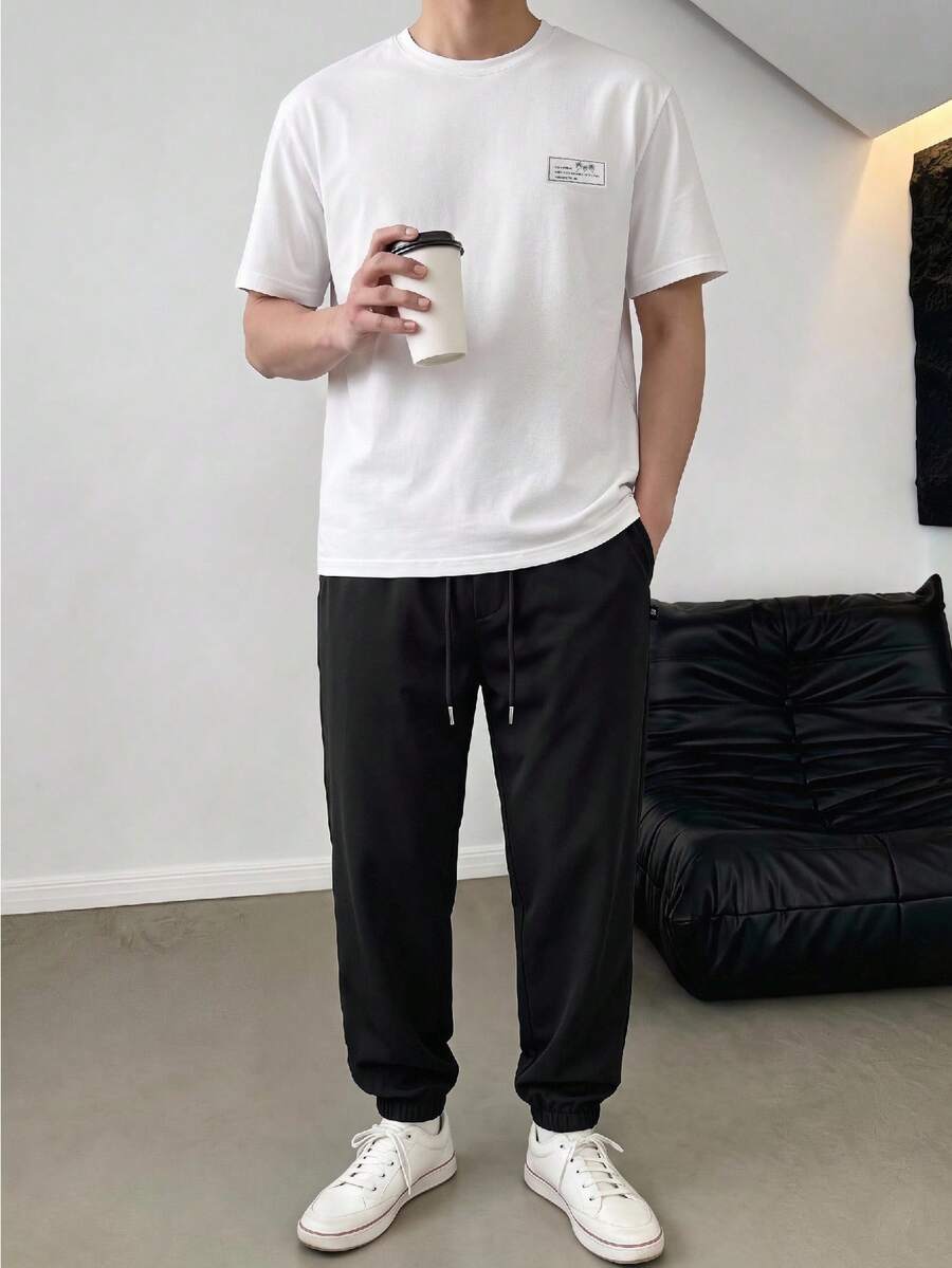 Manfinity BRENVOR Men's Letter Print Short Sleeve T-Shirt And Drawstring Waist Long Pants Casual Set - Black and White - View 1