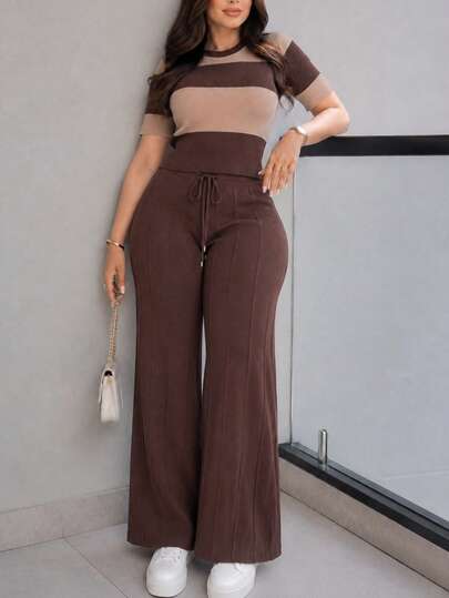 Conjunto de pants casual para mujer. Camiseta de manga corta, cuello redondo. Pants de pierna ancha. Ajuste de cintura natural con resorte ligero y cordón ajustable. Sin bolsillos.