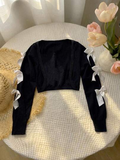 SHEIN MOD كارديجان قصير محبوك بمقاس كبير، أسود، مزين بفيونكة على الأكمام