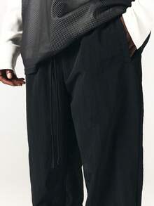 SUMWON Mens Loose Fit Nylon Track Pants With Elastic Ankles And Side Pockets Casual Streetwear Trousers For Spring Summer - Black - View 5