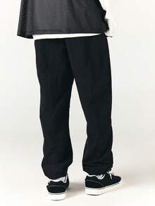 SUMWON Mens Loose Fit Nylon Track Pants With Elastic Ankles And Side Pockets Casual Streetwear Trousers For Spring Summer - Black - View 2