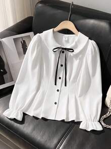 SHEIN 少女裝黑色裝飾蝴蝶結對比鈕扣收腰 A 字版型泡泡長袖白色襯衫，優雅時尚校園風秋冬穿搭 - 白色 - 查看 1