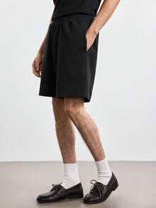 Merionis Men's Solid Color Elastic Waist Pocket Casual Shorts - Black - View 6