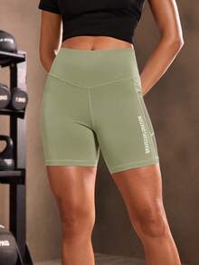 Powerista Women's Mesh Patchwork Phone Pocket Sports Shorts, Summer - Limelight Green - View 6