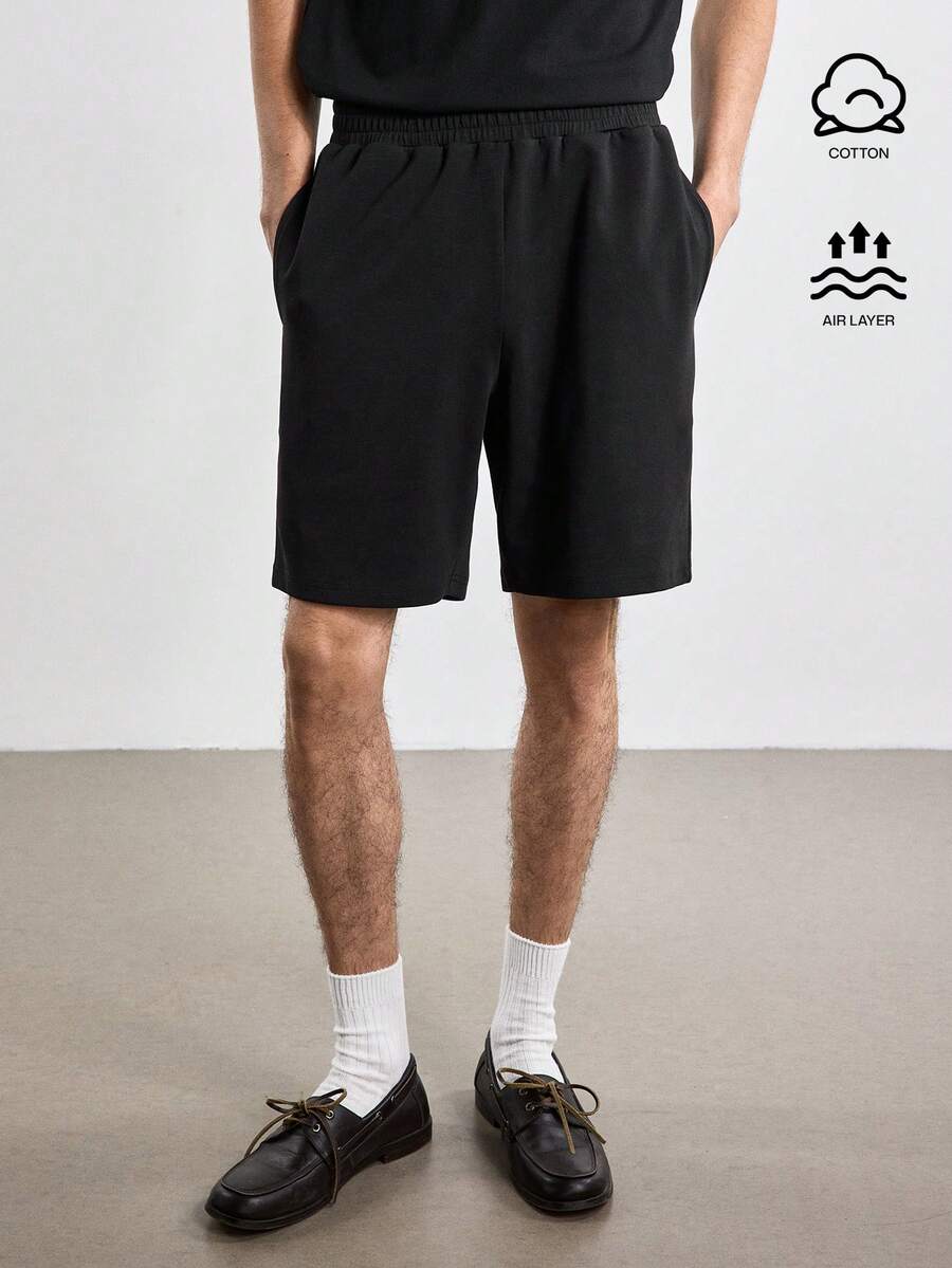 Merionis Men's Solid Color Elastic Waist Pocket Casual Shorts - Black - View 1