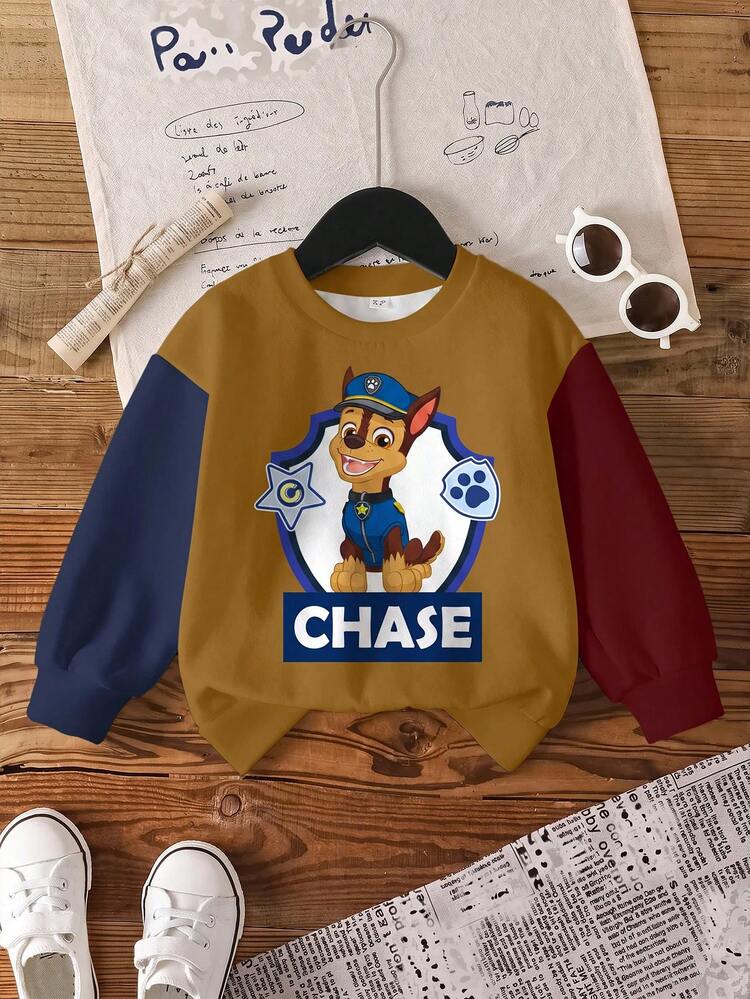 SHEIN | PAW Patrol بلوزة رياضية فضفاضة بياقة طاقم وكتف منخفض، مزينة برسوم كرتونية للكلب والحروف الملونة، ملابس شبابية للارتداء اليومي والتنقل، مناسبة للخريف والربيع - أبيض - مشاهدة 1