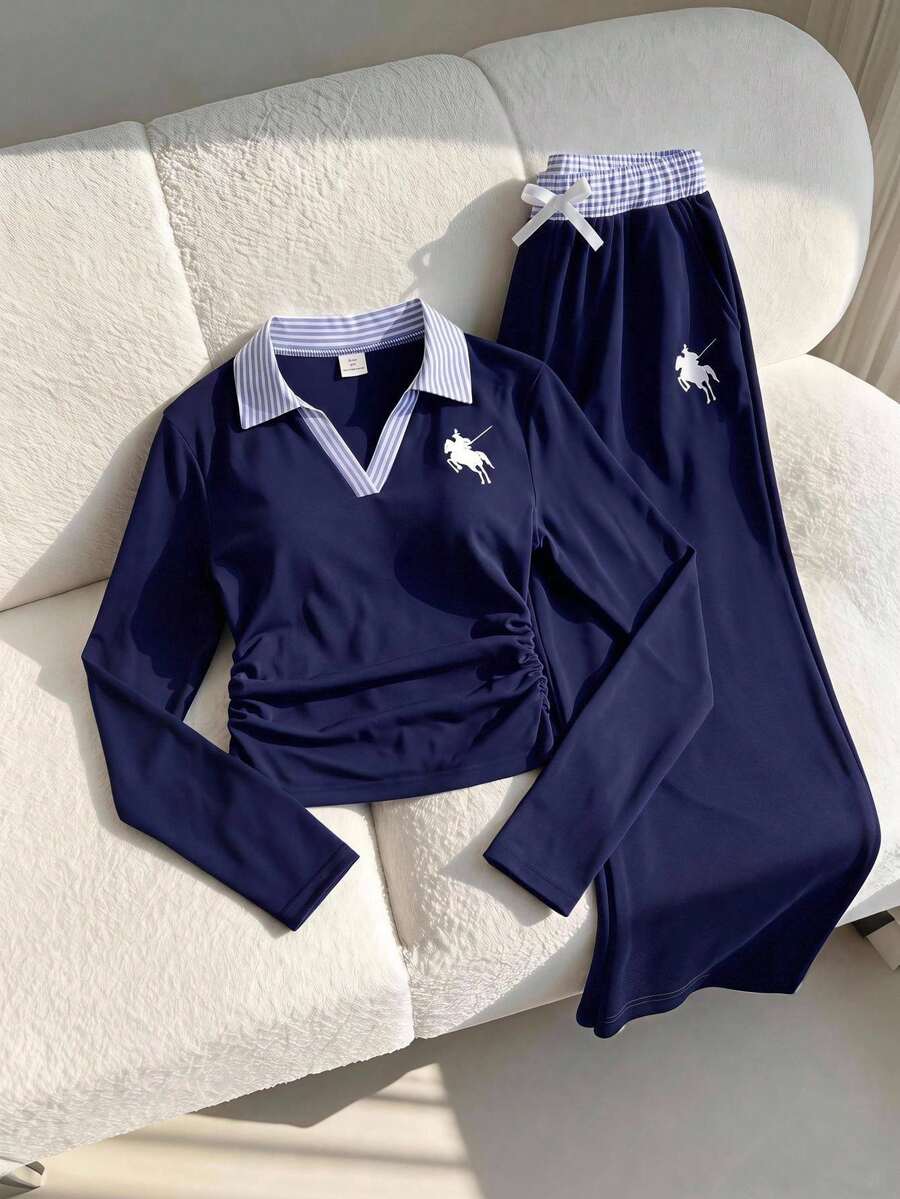 SHEIN Casuvi Kids 青少年女孩兩件套,針織彈性修身 T 恤套裝,對比色梭織條紋 Polo V 領套頭長袖 T 恤搭配對比腰帶寬腿褲,馬匹圖案印花裝飾,時尚復古運動風,適合休閒、運動、度假穿著,春秋季適用 - 藏蓝色 - 查看 1
