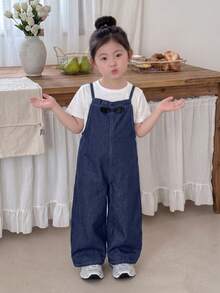 SHEIN Genkimix Kids Girls' Fashion Blue Denim Washed Overalls, Back-To-School Vintage Ruffle Bow Design, Exquisite Bow Decoration On Chest, Loose Straight Leg Fit, Soft And Comfortable Fabric - Dark Wash - View 8