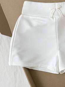 SHEIN شورت أبيض محبوك بخصر عالي مزين بفيونكة مضلع للفتيات المراهقات - أبيض - مشاهدة 3