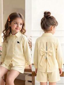 SHEIN Young Girls Shirt Set, Light Yellow Fine Striped Woven Set, Collared Shirt With Small Horse Pattern Detail On Chest, Hollow Back With Large Bow, Elastic Waist Shorts Matching Set, Smooth And Skin-Friendly Fabric, Gentle And Fresh, Simple And Exquisite For Daily Wear - Pink - View 5