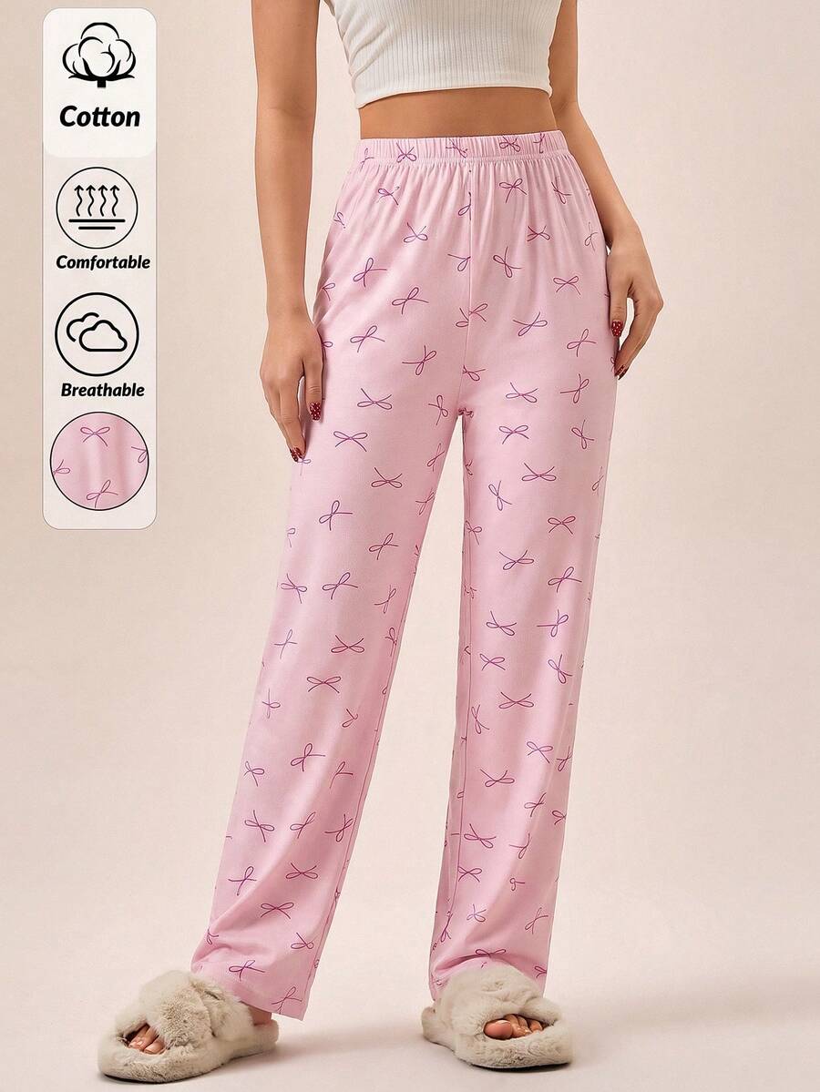 SHEIN بنطال نوم نسائي ناعم جداً باللون الوردي بخصر عالي وطبعة فيونكة مريح للارتداء اليومي - وردي - مشاهدة 1