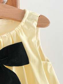 Cozy Pixies Gaun Bayi Perempuan Tanpa Lengan dengan Hiasan Pita Besar dan Leher Bulat - Mustard Yellow - View 3