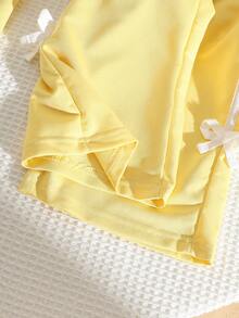 SHEIN Playful Pals 女童春夏休閒新款 T 恤套裝，雙條紋編織帶與 3D 蝴蝶結裝飾，圓領落肩袖 T 恤上衣搭配休閒長褲，2 件套，適合日常穿著、上學、外出、度假、運動、派對與節日 - 黃色 - 查看 9