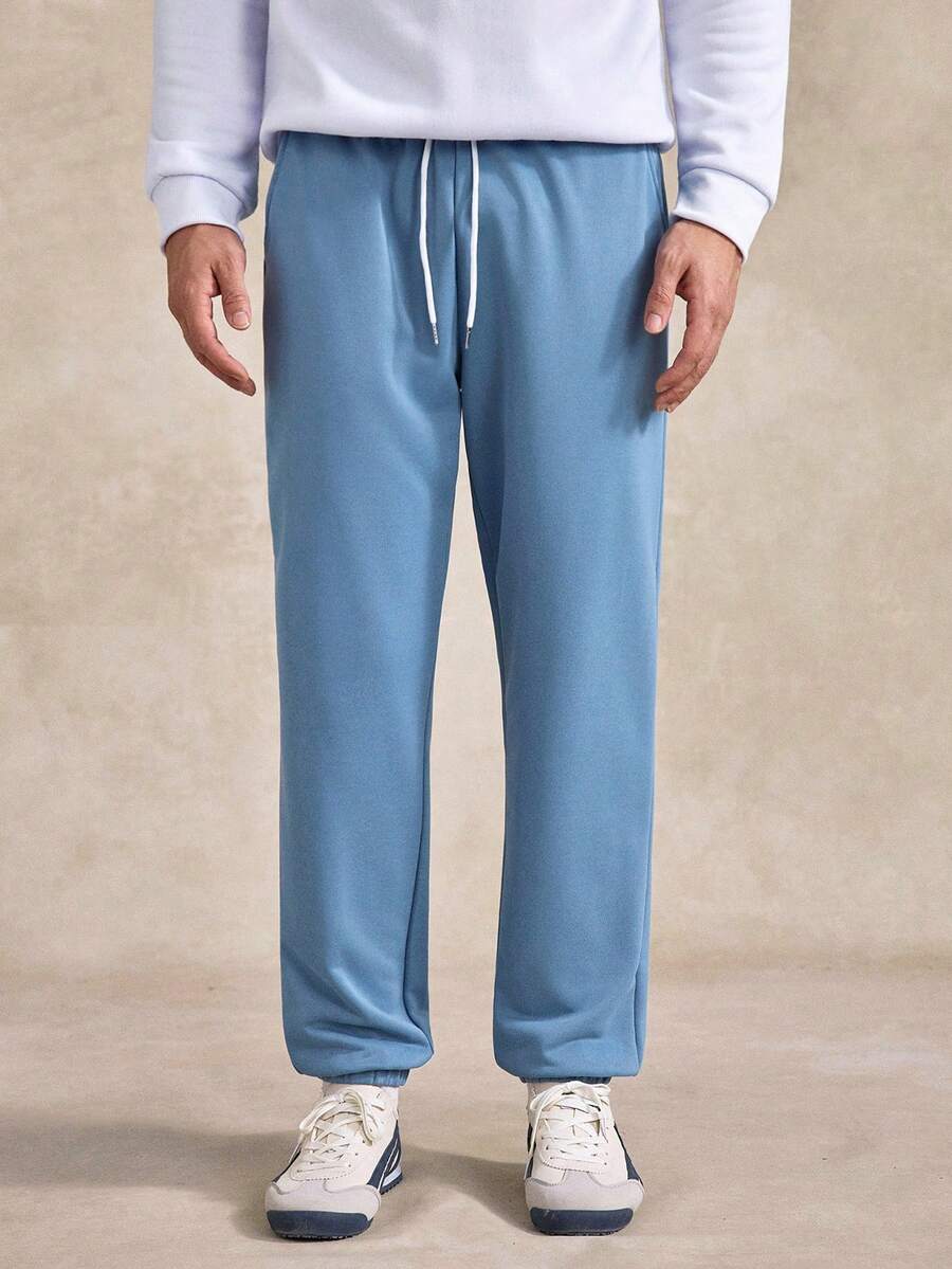 Celana Jogging Kasual Pria Warna Polos dengan Tali Serut di Pinggang dan Saku - Baby Blue - View 1