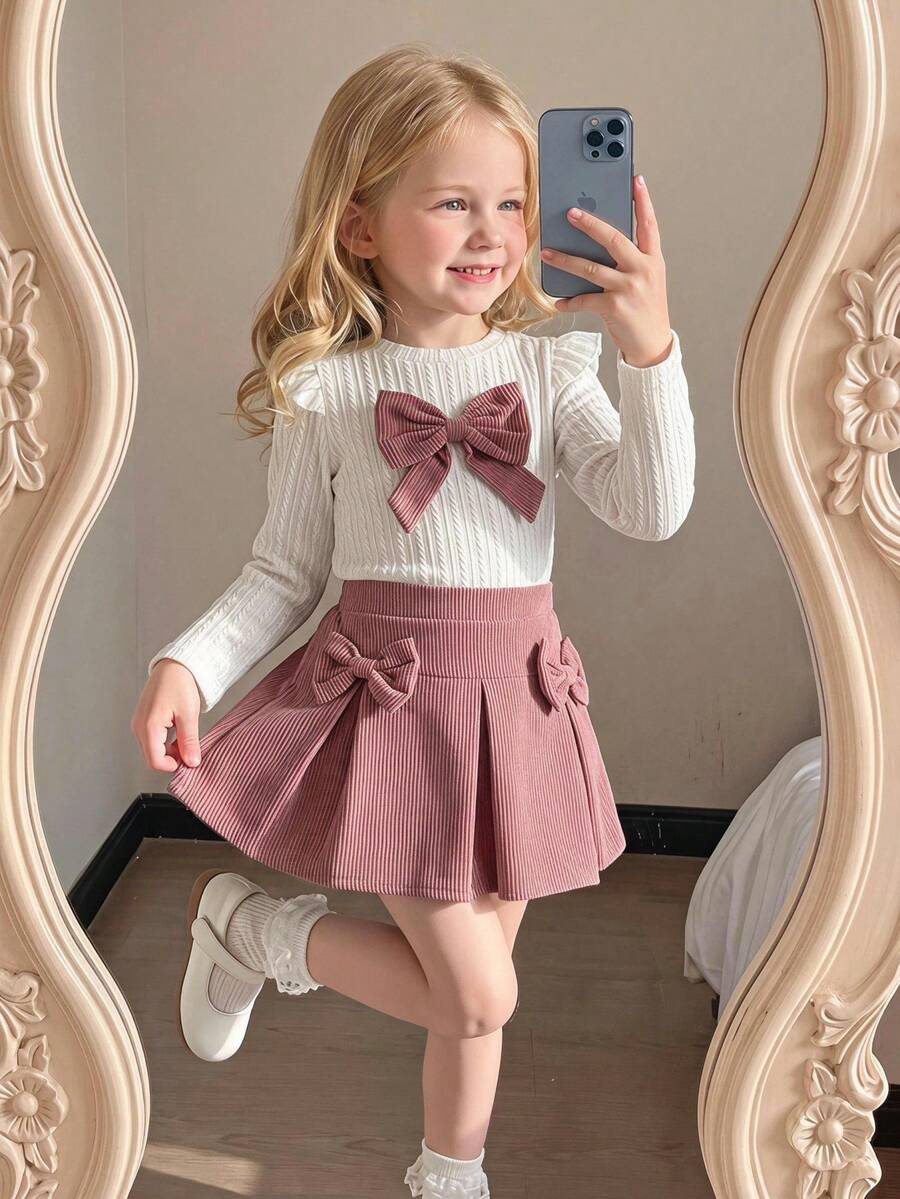 Elladie kids 4-7 岁女童休闲甜美白色针织提花蝴蝶结装饰荷叶边长袖圆领上衣和粉色灯芯绒松紧腰百褶裙，适合日常穿着、休闲外出