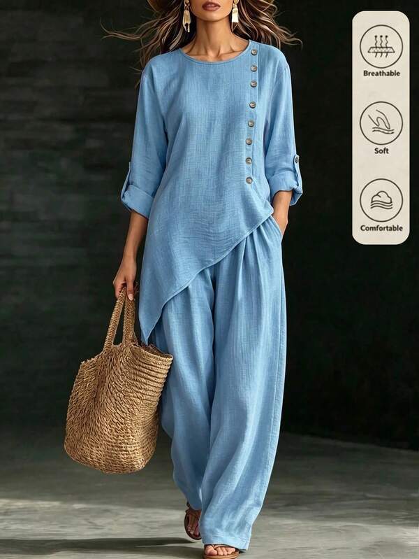 Louniche Women's Autumn Blue Solid Fabric Design Crew Neck Button Decor Asymmetrical Hem Loose Long Sleeve Cuff Button Design Country Casual Bohemian Style Elegant Workplace High-Energy Travel Vacation Vibe Outfit Autumn Clothing Autumn Top Autumn Pants Autumn Set Niche Design Versatile Top Pants 2-Piece Set