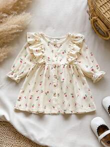 SHEIN Vintaside Kids 1件女嬰春秋款奶油色與玫瑰紅溫柔田園風小玫瑰滿版印花荷葉袖荷邊長袖單排扣A字洋裝，收腰寬鬆版型，適合日常穿著、戶外出遊、1歲生日派對、家庭聚會、拍照 - 杏色 - 查看 3