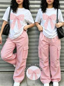 SHEIN 1套粉色蝴蝶結圖案上衣與粉色工裝褲，適合13-16歲女孩，舒適簡約休閒日常風格 - 彩色 - 查看 1