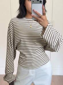 SHEIN تي شيرت خريفي للبنات المراهقات بقصة فضفاضة وكاجوال منسدلة، أكمام باتوينج طويلة، نسيج مضلع محبب، ياقة دائرية، حافة ضيقة، قماش مطاطي، بتصميم جرس ومكشكش للمدرسة - لون مشمشي - مشاهدة 2