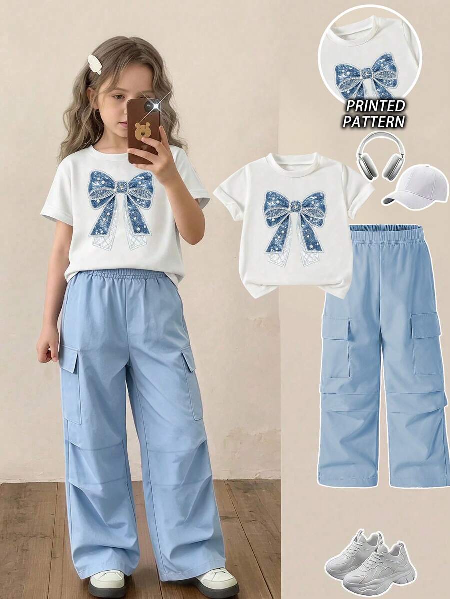 SHEIN 青少年女孩休閒短袖圓領T恤與工裝褲兩件套,可愛蝴蝶結印花設計,四季穿著,休閒時尚,百搭短袖T恤與工裝褲套裝 - 彩色 - 查看 1